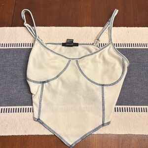 Forever 21
cream tank with navy stitching 
adjustable straps
size L